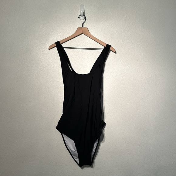 Never worn awesome swimsuit. It didn’t fit me, I have the size that did. 😊 - Picture 2 of 6